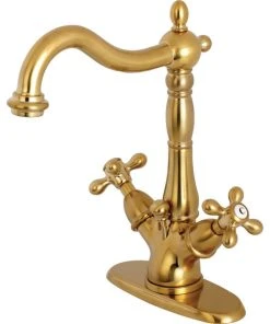 Kingston Brass Two-Handle Bathroom Faucet With Brass Pop-Up, Brushed Brass
